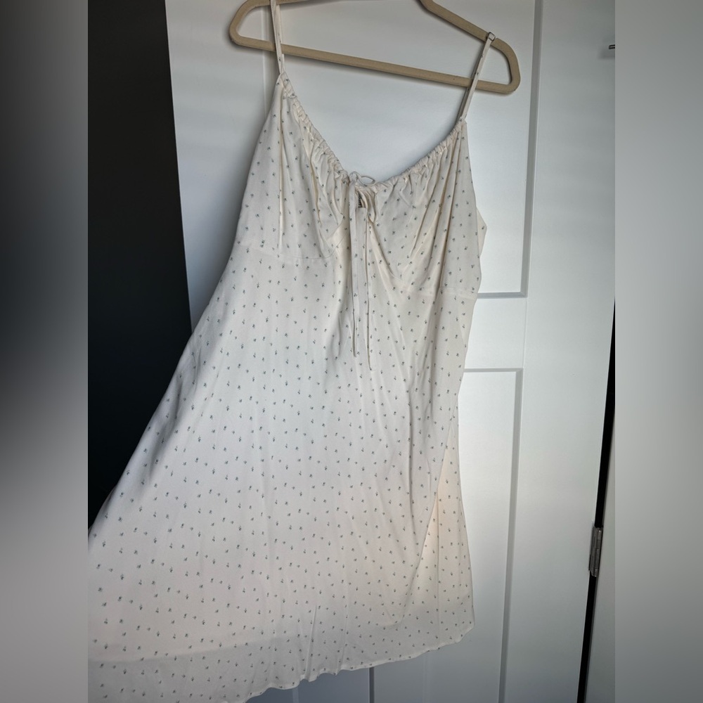 White sundress with blue flowers